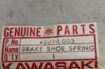 1966-1976 W1 H1 W2 KAWASAKI (KB39) NOS OEM 42020-003 SPRING BRAKE SHOE