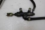 1987 KAWASAKI NINJA ZX750 (#299) REAR BRAKE MASTER CYLINDER W/ RESERVOIR